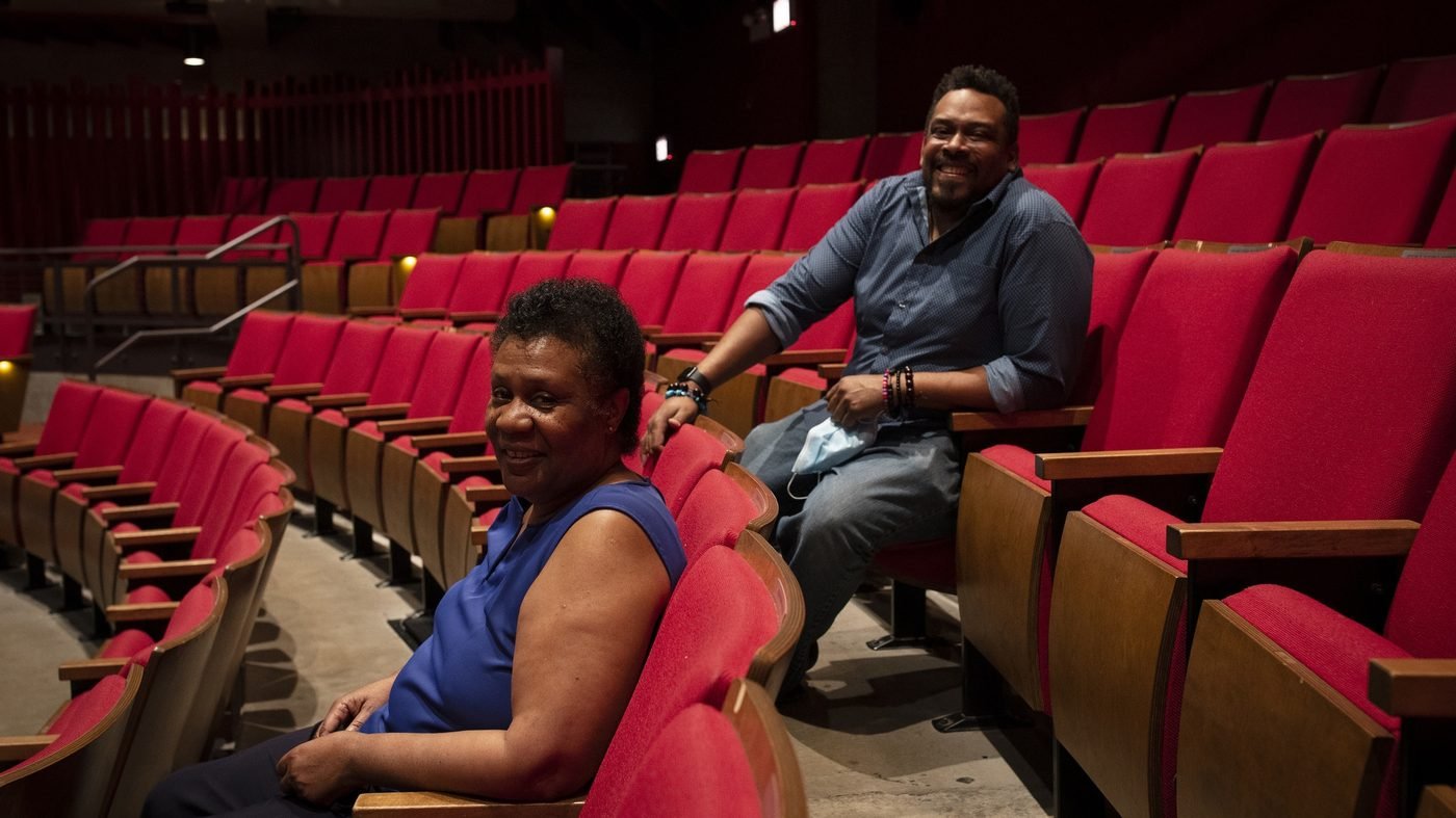 Daryl D. Brooks and Jackie Taylor in the seats of Black Ensemble Theater