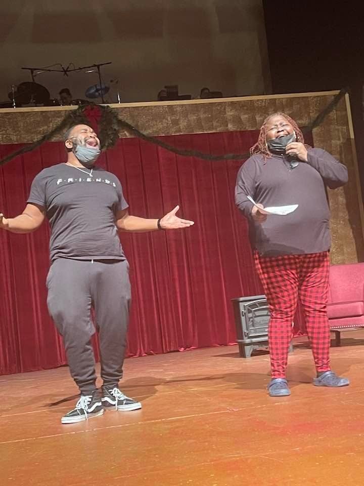 Performers rehearsing on stage at Black Ensemble Theater